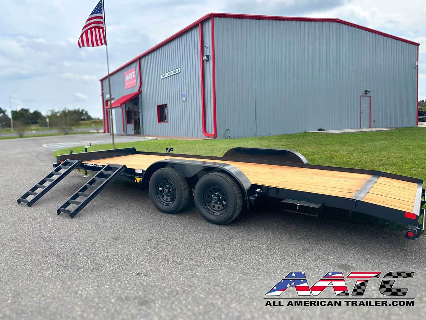 A reliable and versatile 20-foot car hauler trailer from Big Tex, model 70CH. This Big Tex Trailer features a tandem axle, wood deck, and a convenient dovetail design. With a 7000 GVWR, electric brakes, and a load capacity of 4940 lbs, it's a dependable choice for various utility and car hauling needs. The bumper pull tongue type makes it easy to tow and transport your vehicles.